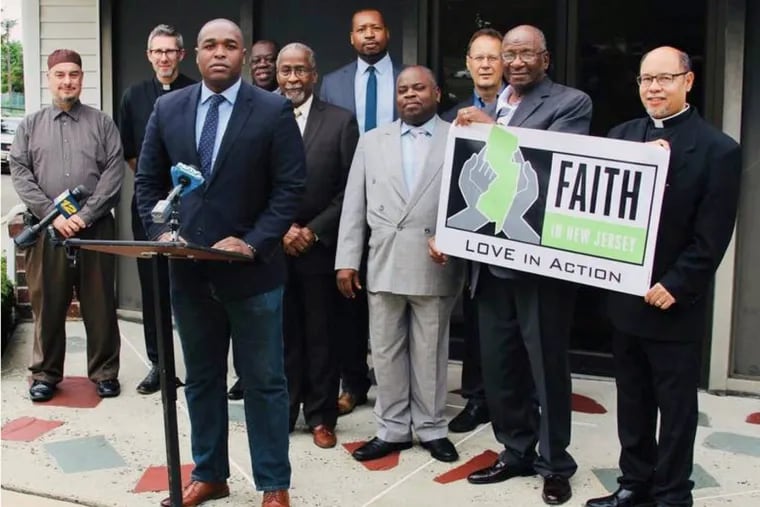 Members of Faith In New Jersey at a news conference in Edison in 2018 calling for Gov. Murphy to sign the independent prosecutor bill.