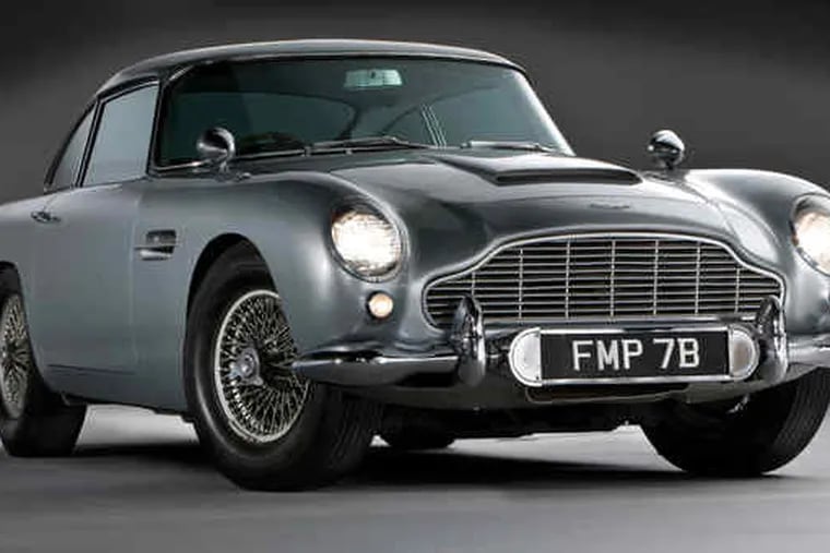 The 1964 Aston Martin Silver Birch DB5 owned by Jerry Lee, in a computer-enhanced photograph. It boasts a smoke screen, radar, and an ejector seat.