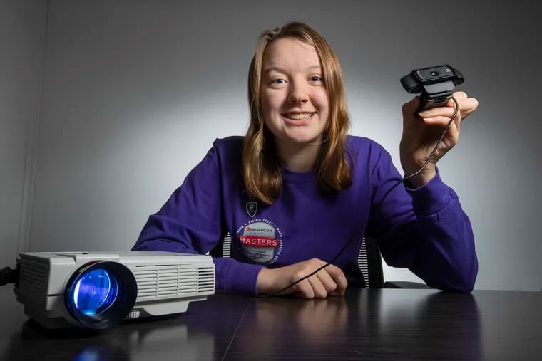 Alaina Gassler, 14, of West Grove, Pa., won the $25,000 top prize in the Broadcom MASTERS national science competition for middle school students. She designed and built a system to eliminate blind spots in cars, rigging up a webcam and a digital projector to her family's Jeep Grand Cherokee.