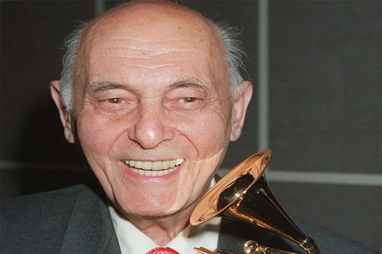 Sir Georg Solti with his 30th Grammy Award in 1992. He won 32 in all, and worried that Michael Jackson would best him. MALCOLM CLARKE / AP