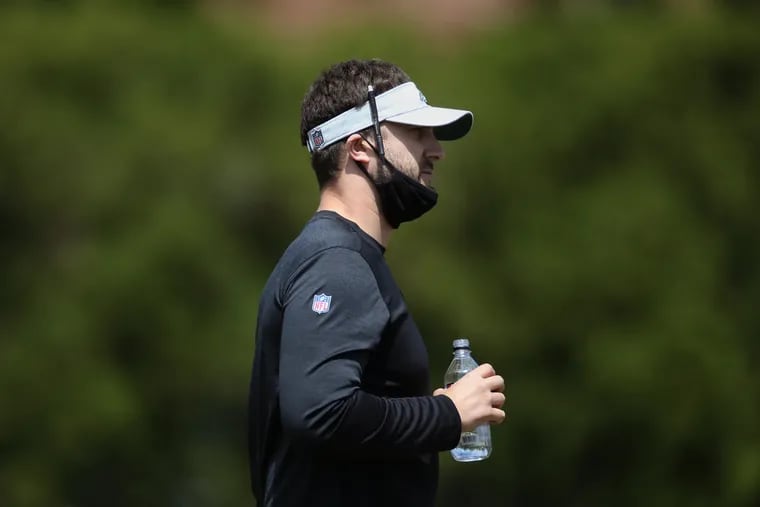 Eagles coach Nick Sirianni watched players warm up during rookie minicamp at the NovaCare Complex in South Philadelphia on May 14.