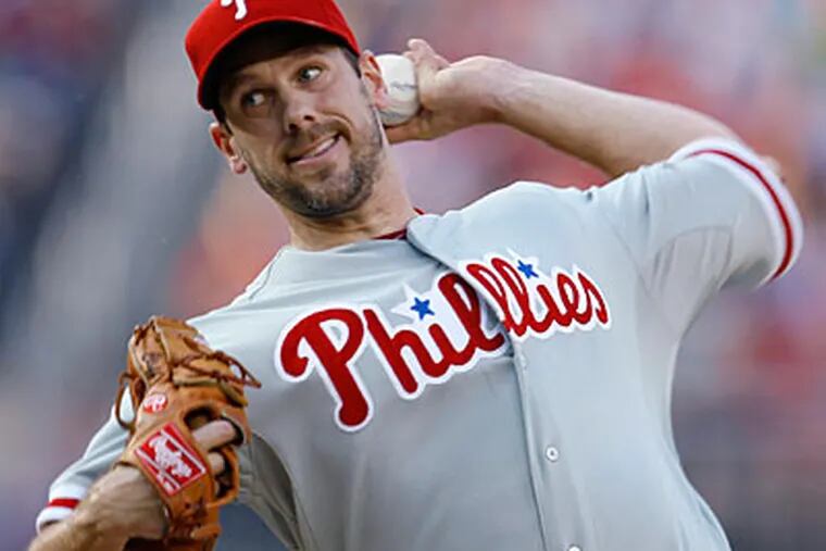 Cliff Lee allowed back-to-back home runs in the second inning of Sunday's game. (Carolyn Kaster/AP)