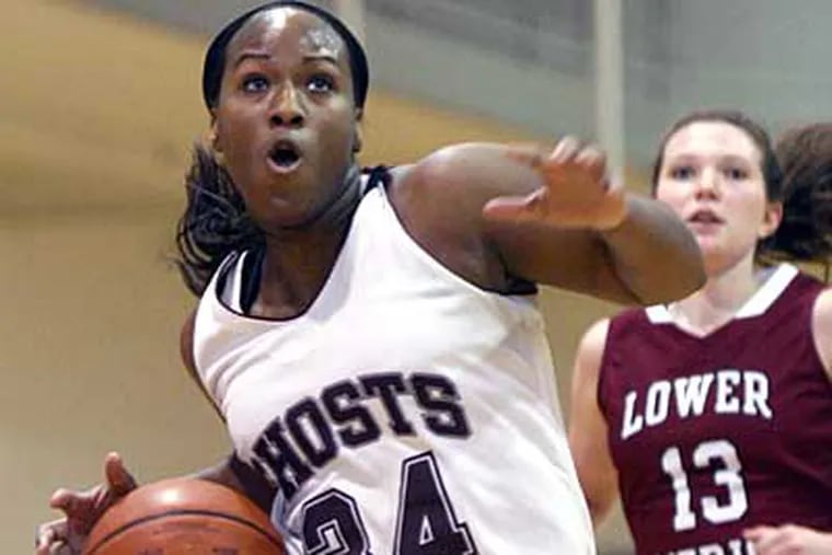 Abington's Aiyannah Peal drives for a layup in the third quarter against Lower Merion. (Lou Rabito / Staff)