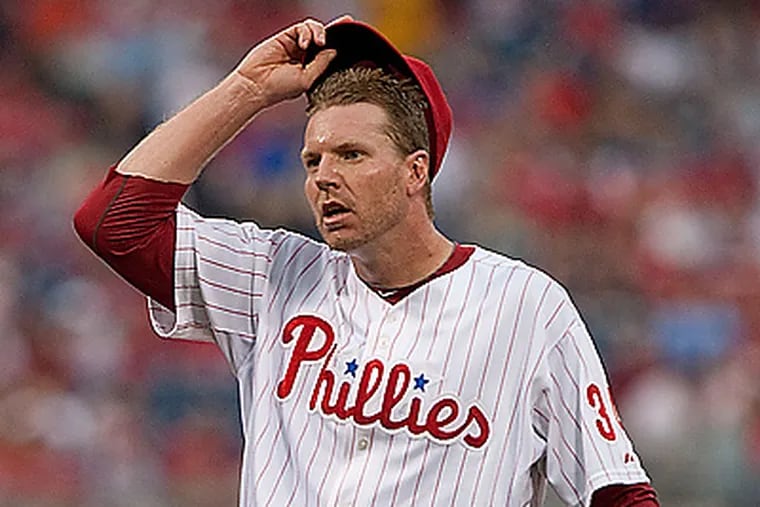 Roy Halladay pitched seven innings and allowed two earned runs.  (David M Warren / Staff Photographer)