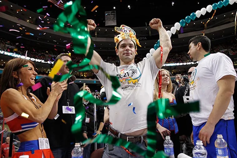 James "The Bear" McDonald, from Ganby, Connecticut wins the Sportsradio 94 WIP's Wing Bowl on Friday morning February 1, 2013. (Alejandro A. Alvarez/Staff Photographer)