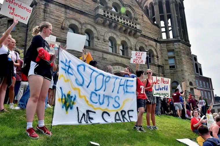 Students gather during a walkout in protest of an administration proposal to cut 9% of majors amid a $45 million budget shortfall at West Virginia University in Morgantown, W.Va., Monday, Aug. 21, 2023.