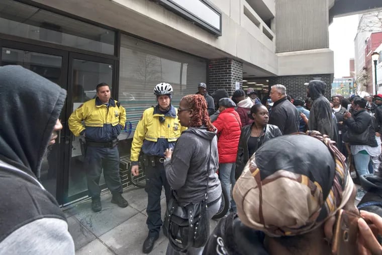 People wait in long lines during the last day of parking amnesty program at the City Of Philadelphia Bureau of Administrative Adjudication office.