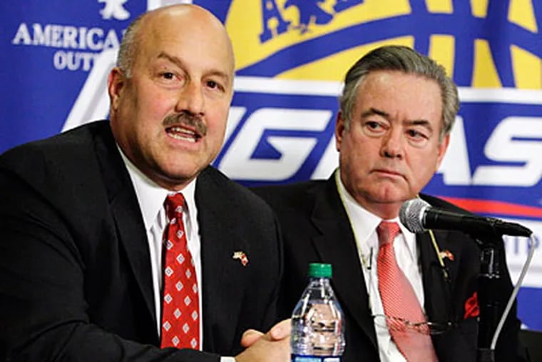 Steve Addazio and athletic director Bill Bradshaw announced Temple's plans to join the Big East on Wednesday. (Frank Franklin II/AP)