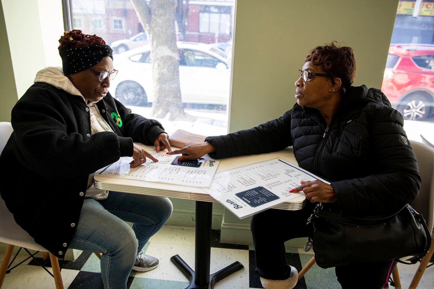 Wanda Walker, 62, of West Philadelphia, left, and her sister Bernadet Cash, 60, of West Philadelphia, came to Bart’s Bagels for the first time on Wednesday, Jan. 22, 2020. Walker heard about it from her sister who saw it in the news and wanted to try it. “So far I’m really impressed,” Walker said. “I want to sit down with a cup of tea and enjoy it.”