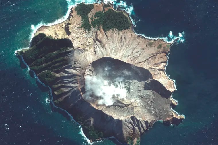 In this satellite image, steam rises from the volcano on White Island off the coast of Whakatane, New Zealand.