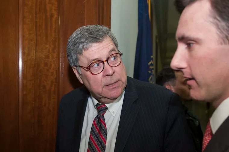 Attorney General nominee William Barr, left, turns to answer a reporter's question as he arrives to meet with Sen. Ben Sasse, R-Neb., on Capitol Hill, Wednesday, Jan. 9, 2019 in Washington.