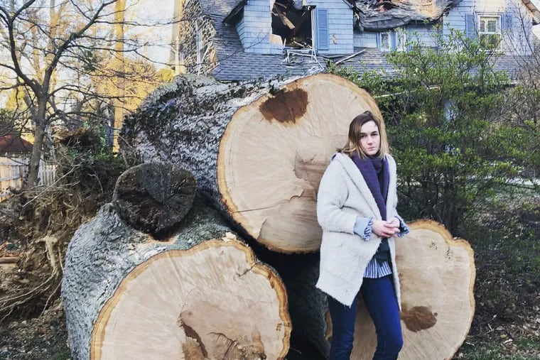 Courtenay Harris Bond in front of the tree that fell on her house after a Nor-Easter in March 2018.