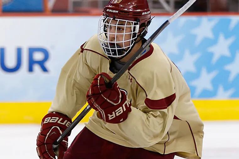 Boston College's Johnny Gaudreau skates down the ice during team
practice for the NCAA men's college hockey Frozen Four tournament
Wednesday, April 9, 2014, in Philadelphia. Boston faces Union in a
semifinal match on Thursday. (Matt Rourke/AP)