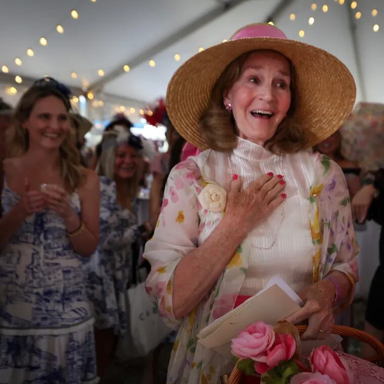 Anne Dowd, of Charlotte, N.C., reacts to winning the “Best Hat to Toe” category.