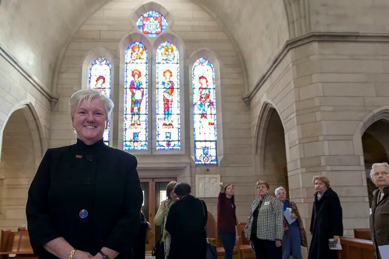 President and alumna of Rosemont College Sharon Latchaw Hirsh Ph.D., during The Chapel of the Immaculate Conception at Rosemont College open house. The chapel is one of only two U.S. chapels with stained glass windows depicting only female saints.  (Chanda Jones / Staff Photographer)