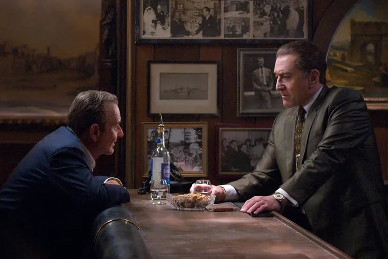 This image released by Netflix shows Joe Pesci (left) and Robert De Niro in a scene from "The Irishman."
