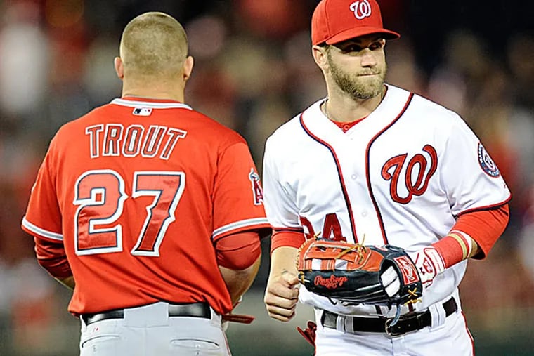 The Nationals' Bryce Harper and the Angels' Mike Trout. (Nick Wass/AP)