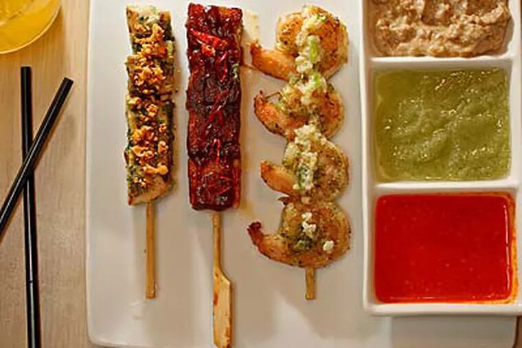 A sampling of anticuchos at Chifa. (Michael Bryant/Staff Photographer)