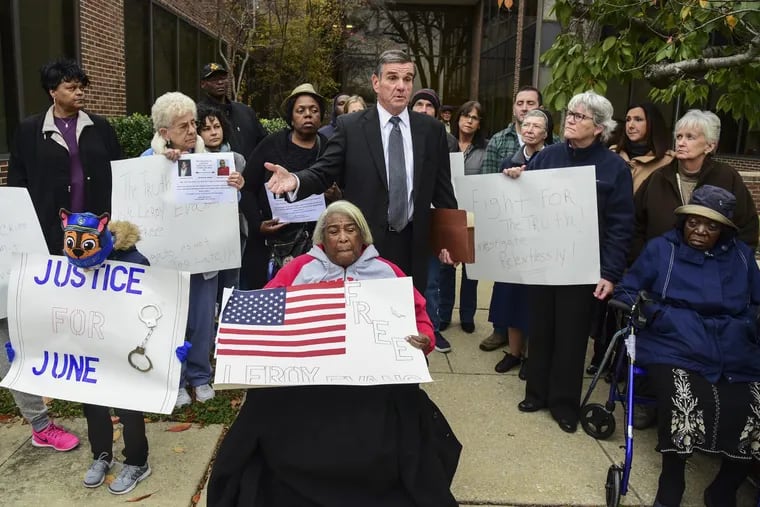 Attorney Michael Malloy (center) addresses a rally November 7, 2017 outside Chester City Hall in support of the authorities re-opening the murder case which Leroy Evans was convicted of back in 1980. In the front seated is Evans’ mother, Alice Evans, 83. CLEM MURRAY / Staff Photographer
