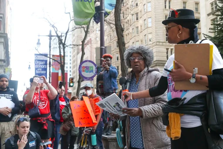 Rosalinde Hobson (center) speaks during a protest outside of 123 South Broad St. in Philadelphia in April, days after her daughter, Angel Davis, was shot in the head during an eviction by a landlord-tenant officer.