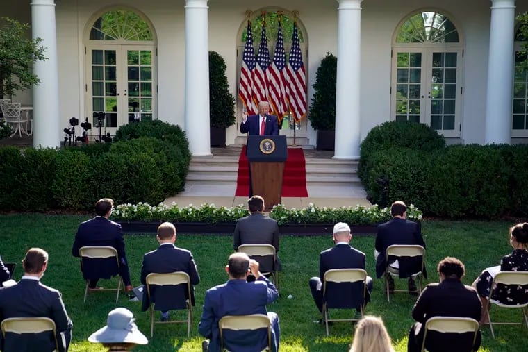 President Donald Trump speaks during a news conference in the Rose Garden of the White House in July.