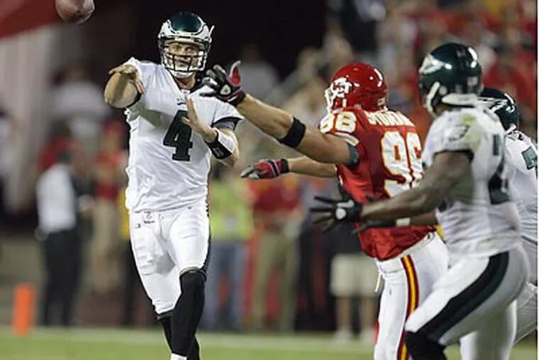 Kevin Kolb was under constant pressure from a blitzing Chiefs defense. (Yong Kim/Staff Photographer)