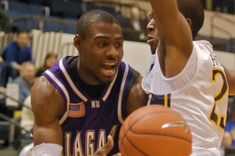 Niagara guard Tyrone Lewis, a junior from Levittown, passes around Drexel&#0039;s Jamie Harris.The Dragons lost their third straight game after missing some late scoring opportunities.