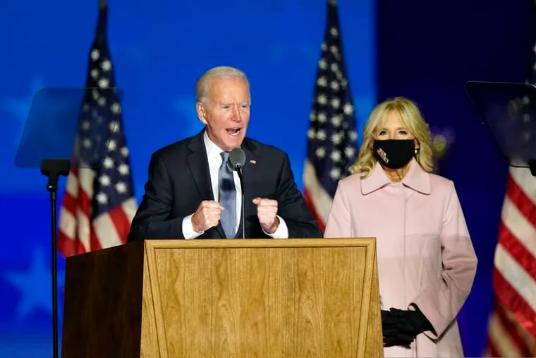 Democratic nominee Joe Biden speaks to supporters Wednesday in Wilmington, Del., as he stands next to his wife, Jill Biden.