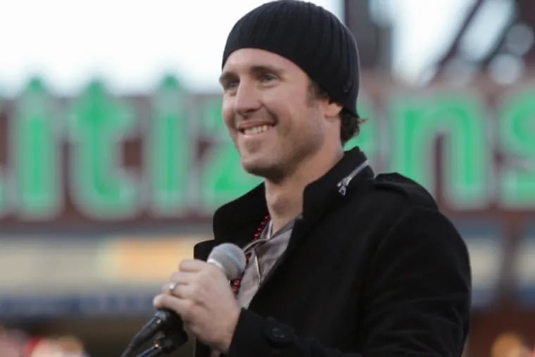 Chase Utley smiles after dropping an F-bomb during the 2008 World Series celebration.