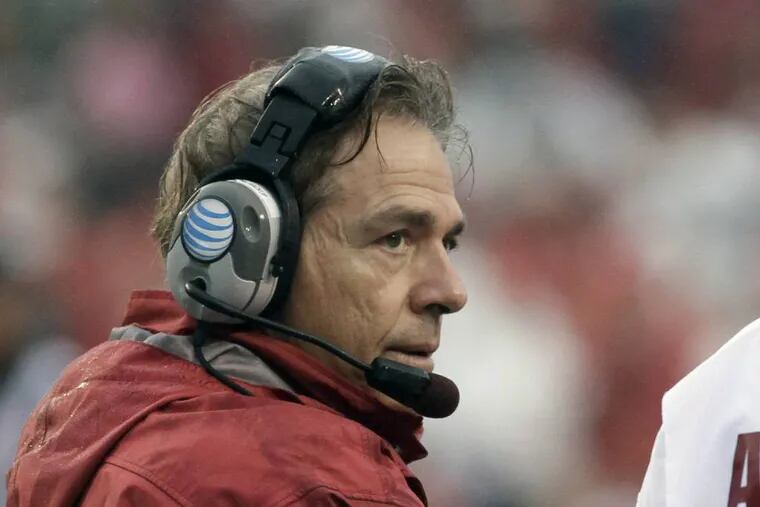 Alabama coach Nick Saban watches the first half of an NCAA college football game against Arkansas in Fayetteville, Ark., Saturday, Oct. 11, 2014. (AP Photo/Danny Johnston)
