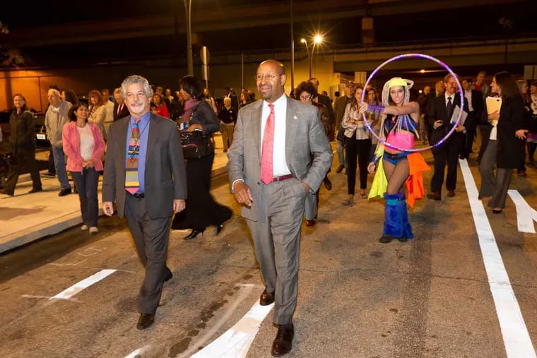 Mayor Nutter leads a crowd of pedestrians at the Race Street Connector opening. (Daniel Burke Photography)