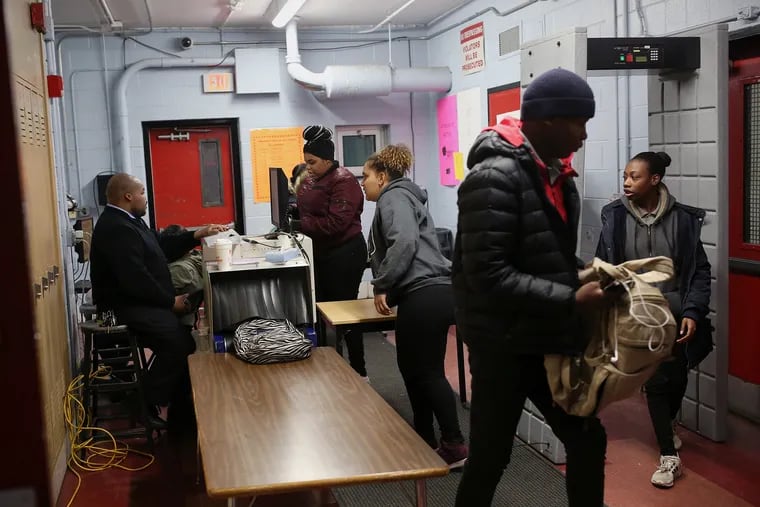 Philadelphia has started scanning middle schoolers for weapons, using handheld wands or metal detectors, such as that seen here at Strawberry Mansion High School on Thursday, Feb. 28, 2019.