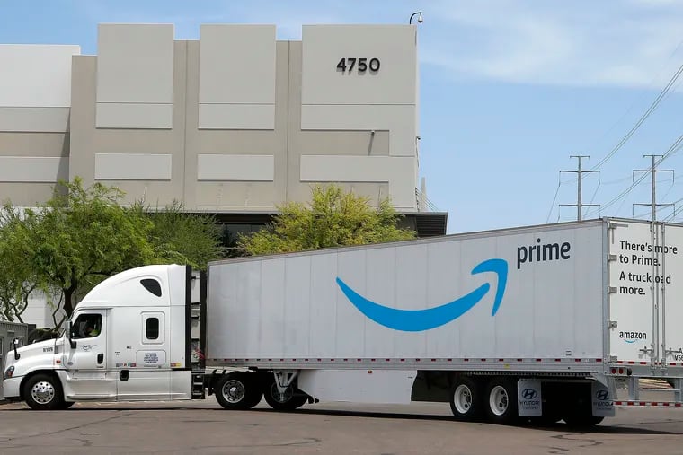 This Wednesday, July 17, 2019 photo shows an Amazon shipping truck at a fulfillment center in Phoenix. Amazon.com Inc. reports financial earnings on Thursday, July 25. (AP Photo/Ross D. Franklin)