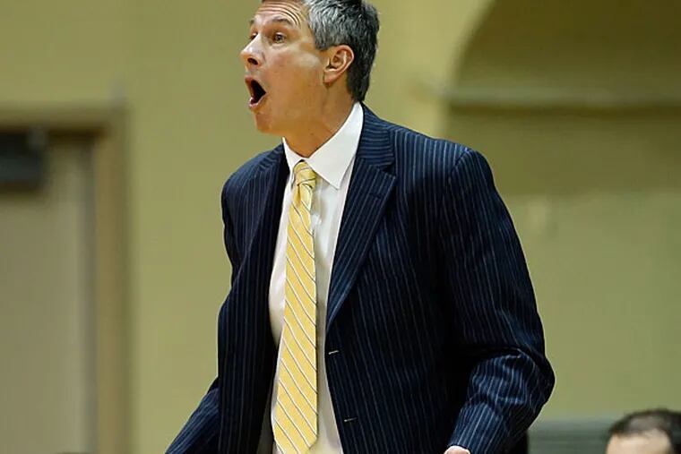 La Salle Head Coach Dr. John Giannini yells to his team against UMass
during the first-half on Wednesday, January 7, 2015.  (Yong Kim/Staff Photographer)