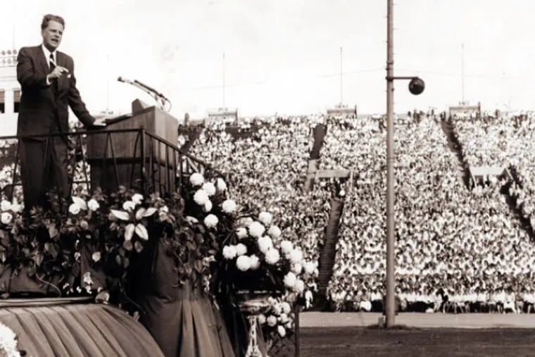 Billy Graham speaking at the 1961 crusade in Philadelphia.