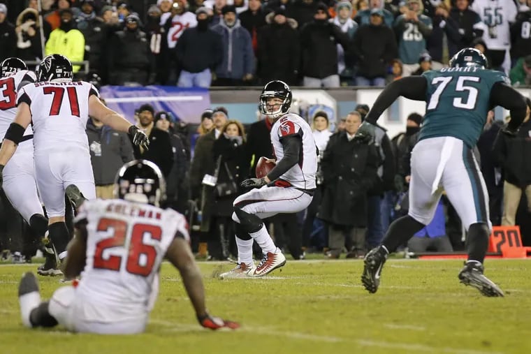 Falcons quarterback Matt Ryan looks for a receiver during the Falcons’ final offensive play in the Eagles’ 15-10 win on Saturday.