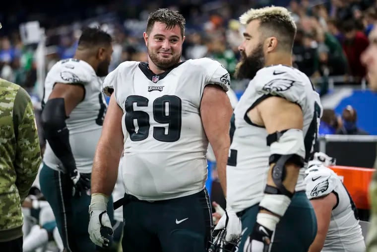 Philadelphia Eagles guard Landon Dickerson (69) and center Jason Kelce (62) talk during the fourth quarter of the Philadelphia Eagles game against the Detroit Lions at Ford Field in Detroit, Michigan on Sunday, October 31, 2021.