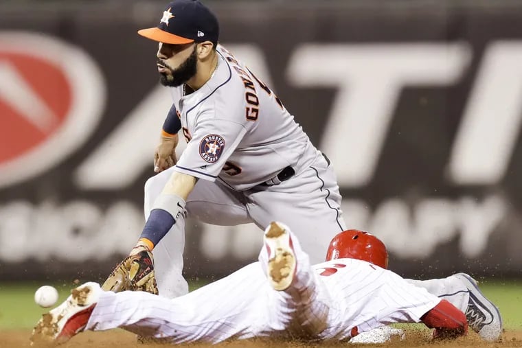 Houston's Marwin Gonzalez, shown here as the Phillies Cesar Hernandez slides into second base, is an intriguing free-agent option.