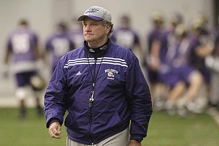 West Chester head coach Billy Zwaan watches his team during a practice. (Charles Fox/Staff Photographer)