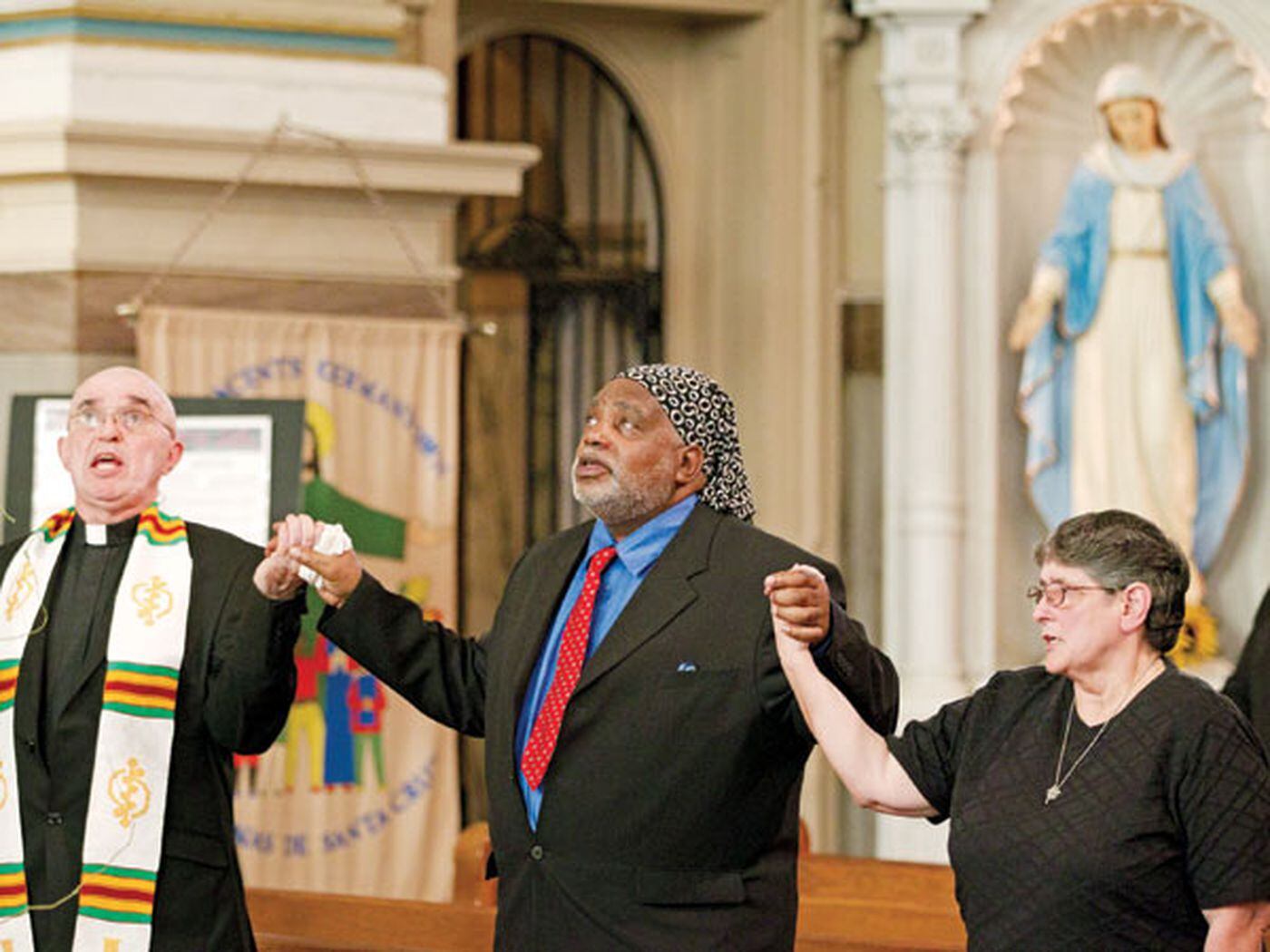 Activists and religious leaders, including Harold Wilson (center), gathered at an East Germantown church in 2018 to pray for criminal justice reform and the abolition of capital punishment in this country. 