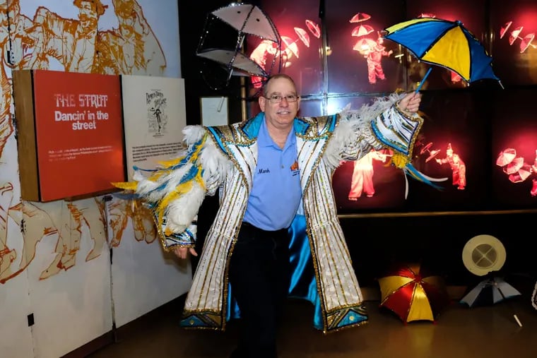 Curator, Mark Montanaro, dances in the Mummers Strut Room at the Mummers Museum in South Philadelphia at 2nd and Washington Avenue on Friday, March 29, 2019.