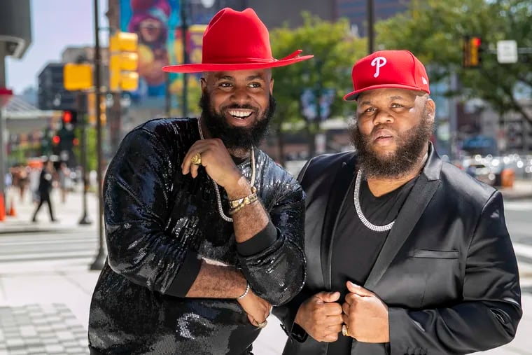 Kevin Parker, left, and Kerry Scott pose for a portrait outside of the Fashion District in Center City, Philadelphia on Wednesday, Sept. 11, 2019. Parker and Scott founded Philadelphia Fashion Week.