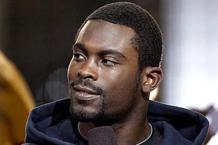 Eagles quarterback Michael Vick recently backed out of an appearance on The Oprah Winfrey Show. (Tony Gutierrez/AP Photo)