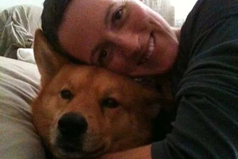 Red Paw founder Jennifer Leara with Coda, an 8-year-old Chow/Shibu Ino mix she rescued.