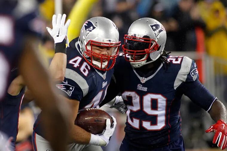 New England Patriots fullback James Develin (46) celebrates a touchdown with running back LeGarrette Blount (29). (Stew Milne/USA Today)