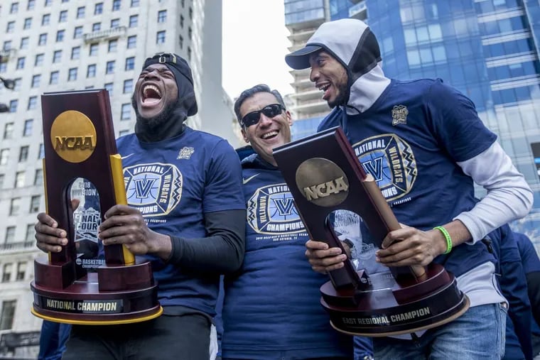 Jay Wright (center), flanked by Eric Paschall (left) and Mikal Bridges during Villanova’s championship parade, has just two returning starters for the 2018-19 season – a stark departure from seasons past.