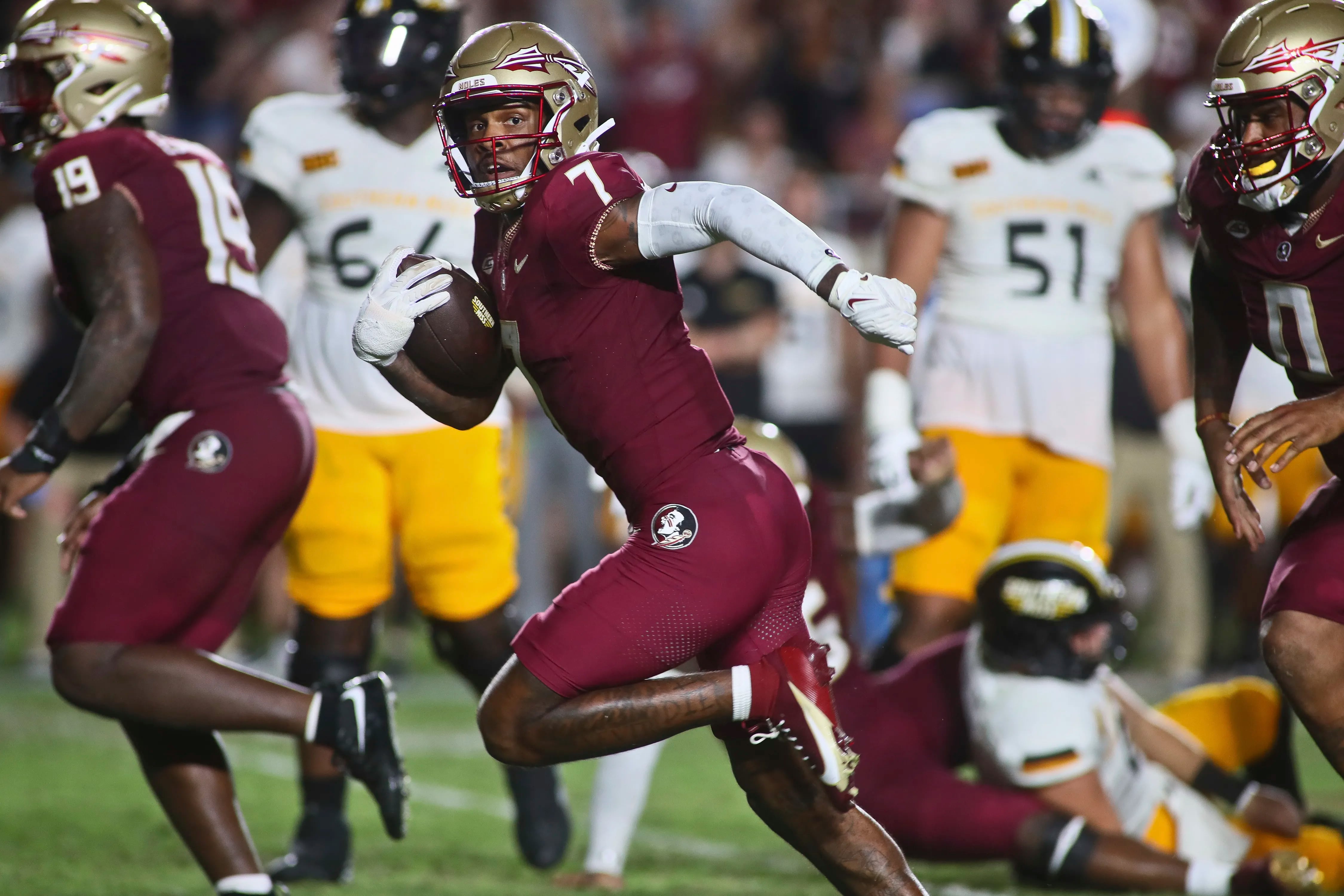 Florida State defensive back Jarrian Jones (7) returns an interception for a touchdown in the third quarter of an NCAA college football game against Southern Mississippi, Saturday, Sept. 9, 2023, in Tallahassee, Fla. FSU won 66-13. (AP Photo/Phil Sears)