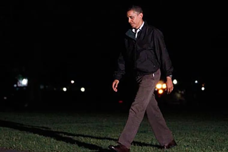 President Barack Obama steps off Marine One at the White House in Washington on Friday. President Obama is returning after his third trip to the Gulf Coast since the oil spill. (AP Photo/Alex Brandon)