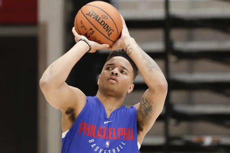 Sixers guard Markelle Fultz shoots the basketball while warming up before the start of team practice in Boston on Tuesday.