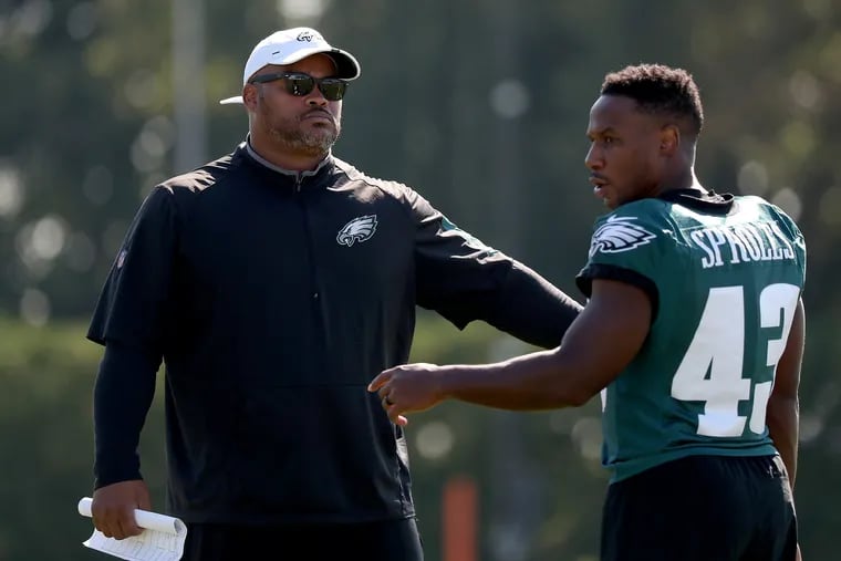 Duce Staley (left), shown with former running back Darren Sproles, is entering his eighth season as the Eagles' running backs coach.